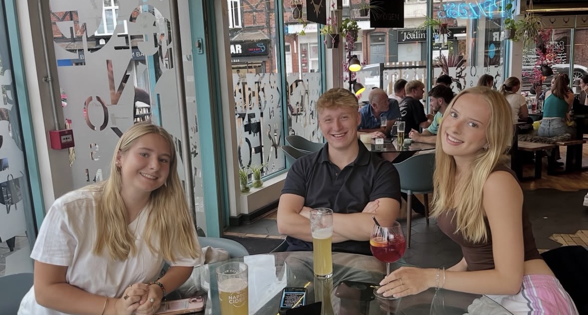 Thomas Boyd with two friends at a pub quiz